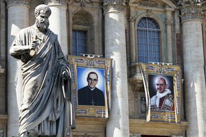 The tapestries of Roman Catholic Archbishop Oscar Romero, left, and Pope Paul VI