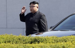 North Korean leader Kim Jong Un arrives for the official opening of the Ryomyong residential area, a collection of more than a dozen apartment buildings, on Thursday, April 13, 2017, in Pyongyang, North Korea.