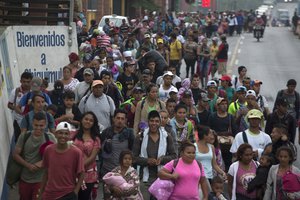 Honduran migrant caravan starts third day in Guatemala, leaving Chiquimula, Guatemala, Wednesday, Oct. 17, 2018.