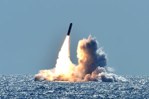 An unarmed Trident II D5 missile launches from the Ohio-class ballistic missile submarine USS Nebraska (SSBN 739) off the coast of California