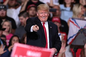 President of the United States Donald Trump speaking with supporters at a Make America Great Again campaign rally at International Air Response Hangar at Phoenix-Mesa Gateway Airport in Mesa, Arizona, 19 October 2018.