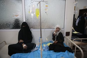 Girls are treated for a suspected cholera infection at a hospital in Sanaa, Yemen, Monday, May. 15, 2017.