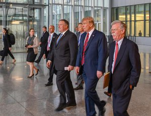 File - U.S.Secretary of State Michael R. Pompeo participates in a press conference with U.S. President Donald J. Trump during the NATO Foreign Ministerial in Brussels, Belgium on July 12, 2018