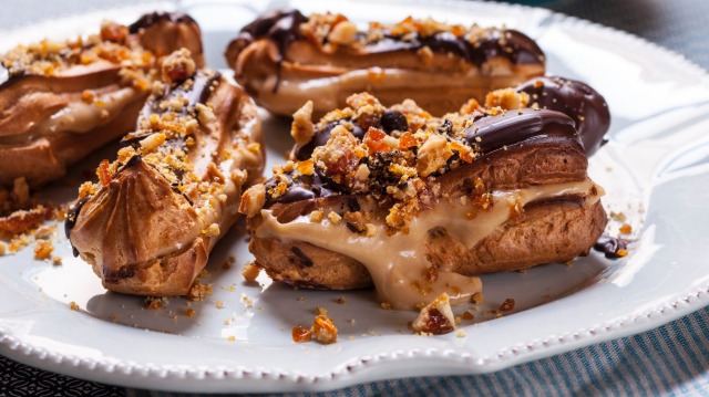 Karen Martini's eclairs filled with coffee cream and decorated with coffee bean and walnut praline.