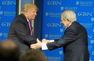 Republican presidential candidate Donald Trump shakes hands with Rev. Pat Robertson during an appearance at Regent University in Virginia Beach, Va., Wednesday, Feb. 24, 2016.