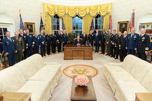 President Donald J. Trump poses for a photo with senior military leaders Tuesday, Oct. 23, 2018, in the Oval Office of the White House.