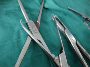 Surgical Forceps - OR instruments - Operating Room - Hospital - Blood Soiled