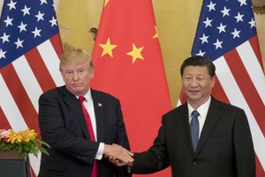 President Donald Trump and Chinese President Xi Jinping shake hands during a joint statement to members of the media Great Hall of the People, Thursday, Nov. 9, 2017, in Beijing, China