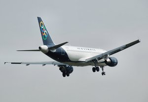 File - Olympic Air Airbus A320-200 (SX-OAU) lands at London Heathrow Airport, England.