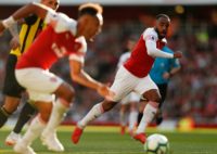 Arsenal's French striker Alexandre Lacazette (R, pictured September 2018) was able to score and tie the game against Liverpool in the Premiere League