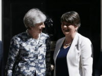 Britain's Prime Minister Theresa May (2L) poses for a picture with Democratic Unionist Party (DUP) leader Arlene Foster (2R), DUP Deputy Leader Nigel Dodds (L) and DUP MP Jeffrey Donaldson at 10 Downing Street in central London on June 26, 2017.