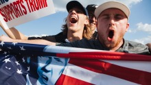 Supporters at a campaign rally with US President Donald Trump and Republican candidate  Ron DeSantis in Florida. For all ...