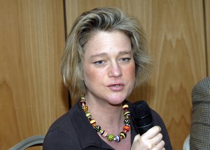 The out-of-wedlock daughter of Belgium's King Albert II, Delphine Boel, left, talks to the media during a press conference presenting her recently published book "Cutting the Ombilical Cord", in a hotel in Brussels, Wednesday April 9, 2008