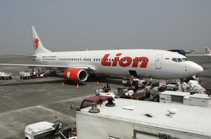 In this May 12, 2012 file photo, a Lion Air passenger jet is parked on the tarmac at Juanda International Airport in Surabaya, Indonesia