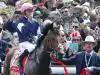2017 Emirates Melbourne Cup main race. Race winner Rekindling ridden by Corey Brown salutes the crowd on return to scale.      Picture: David Caird