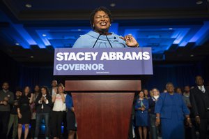 Georgia Democratic gubernatorial candidate Stacey Abrams speaks to supporters about her expectations of a run-off during an election night watch party, Tuesday, Nov. 6, 2018, in Atlanta.