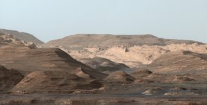 This composite image of the landscape of Mars, looking toward the higher regions of Mount Sharp, was taken on September 9, 2015, by NASA's Curiosity rover.