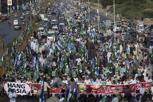 Supporters of Jamaat-i-Islami, a Pakistani Islamist party, participate in a rally to condemn a Supreme Court decision that acquitted Asia Bibi, a Christian woman, who spent eight year on death row accused of blasphemy, in Karachi, Pakistan, Sunday, Nov. 4, 2018.