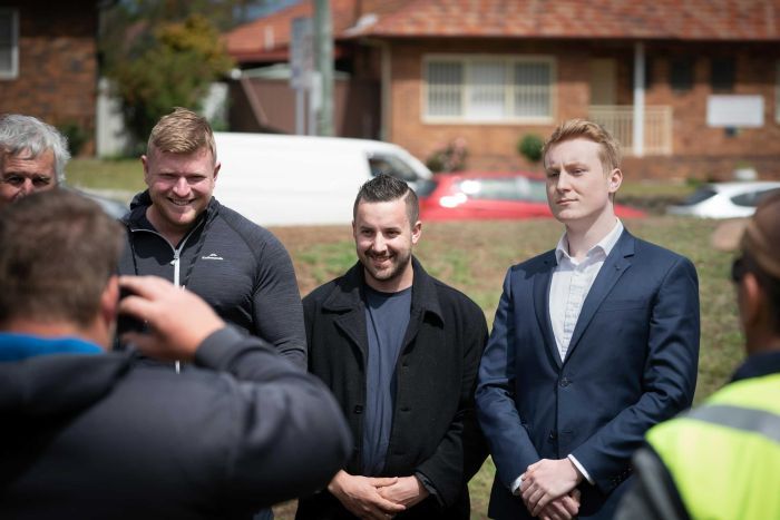 Blair Cottrell (left) and Oscar Tuckfield (right) at a rally organised by Cottrell's lawyer.