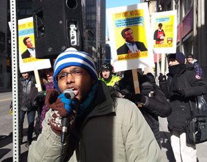 Tory's Lies Cost Lives protest demanding more homeless shelter beds. Protesters picket outside the CD Howe Institute where Tory is speaking.