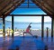 Yoga to start the day at Qamea Island Resort, Fiji.