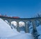 Admire the scenery over a drink on the red Apres-Ski Train of the Matterhorn Gotthard Bahn.