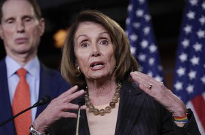 House Minority Leader Nancy Pelosi, D-Calif., joined at left by Sen. Ron Wyden, D-Ore., the ranking member of the Senate Finance Committee, holds a news conference on Capitol Hill to respond to the Republican tax reform plan in Washington, Thursday, Nov. 2, 2017.