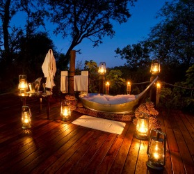 A LANTERN-LIT BATH BAINES SANCTUARY CAMP, BOTSWANA 
With just five suites, Baines Sanctuary Camp is one of Africa's most ...