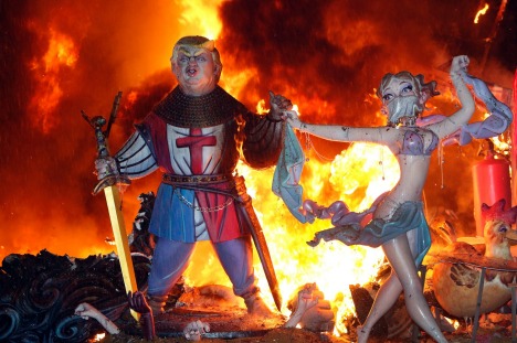 A ninot representing U.S. President Donald Trump burns on the last night of the Fallas Festival in Valencia, Spain, ...