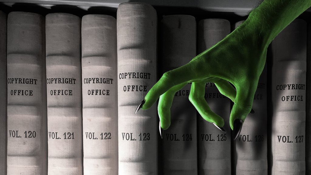 Ghastly hand reaches in front of Copyright Office tomes.