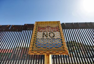 The international border cuts through Nogales, Sonora, Mexico, rear, and Nogales, Ariz., as seen Monday, April 9, 2018, from Nogales, Ariz.