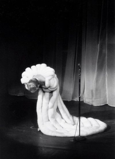 wehadfacesthen:
“Marlene Dietrich takes a bow at the Théâtre de l’Étoile, Paris, 1959, wearing the Jean Louis swansdown cape
”