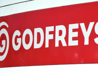 A sign bearing the Godfrey's logo is pictured in Brisbane, Wednesday, Jan. 13, 2016. Shares in Godfreys have tumbled by more than 30 per cent after the vacuum cleaner retailer slashed its full year profit guidance and its chief executive stepped down. (AAP Image/Dan Peled) NO ARCHIVING