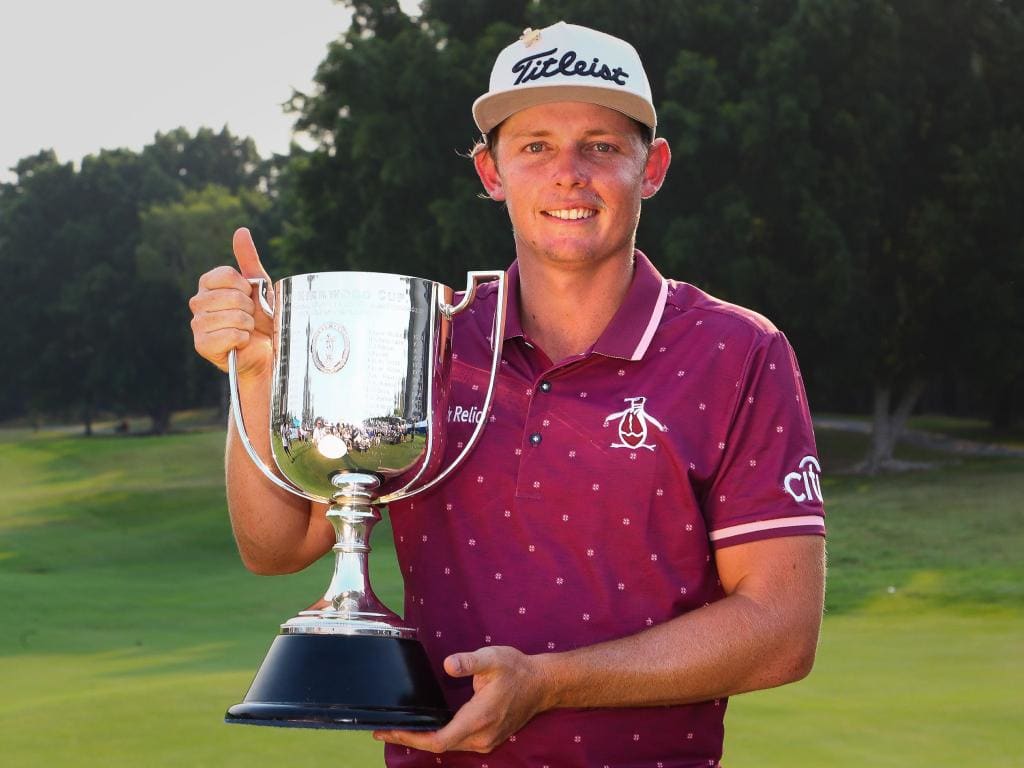 Cameron Smith of Australia celebrates with the Kirkwood Cup after winning the Australian PGA Championship at the Royal Pines golf course on the Gold Coast on December 2, 2018. (Photo by Patrick HAMILTON / AFP) / -- IMAGE RESTRICTED TO EDITORIAL USE - STRICTLY NO COMMERCIAL USE --