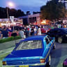 Cars and crowds gather in Braddon for the traditional Summernats cruise, this time in 2015.