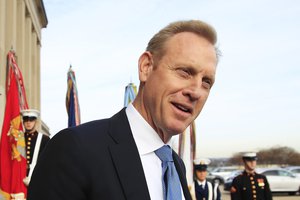 FILE - In this Wednesday, Dec. 19, 2018 file photo, Deputy Defense Secretary Patrick Shanahan, speaks to reporters on the steps of the River entrance of the Pentagon.