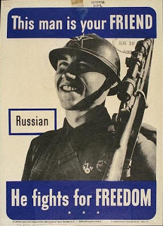 Poster: "This man is your friend -- Russian -- He fights for freedom."