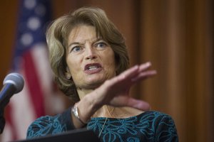 Sen. Lisa Murkowski, R-Alaska, speaks after an order withdrawing federal protections for countless waterways and wetland was signed, at EPA headquarters in Washington, Tuesday, Dec. 11, 2018.