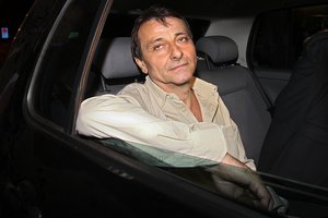 Italian leftist activist fugitive Cesare Battisti leaves prison after Brazil's Supreme Court ordered him freed early Thursday, June 9, 2011.