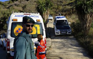 Emergency services look for a 2 year old boy who fell into a well, in a mountainous area near the town of Totalan in Malaga, Spain, Monday, Jan. 14, 2019.