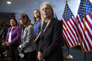 From left, Sen. Mazie Hirono, D-Hawaii, Alexis Goldstein and Sarah Burgess, alumnae of the Holton-Arms School, and Sen. Kirsten Gillibrand, D-N.Y., speak at a news conference in support of Christine Blasey Ford who has claimed she was sexually assaulted at a party by Supreme Court nominee Brett Kavanaugh at a party when they were at in high school, during a news conference on Capitol Hill in Washington, Thursday, Sept. 20, 2018. Holton Arms is the Maryland all-girls school that Christine Blasey Ford attended in the early 1980s. (AP Photo/J. Scott Applewhite)