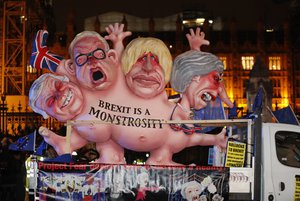 An anti-Brexit effigy is driven around Parliament square after the results of the vote on British Prime Minister Theresa May's Brexit deal were announced in London, Tuesday, Jan. 15, 2019.