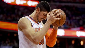 New York Knicks center Enes Kanter (00) shows his frustration in the first half of an NBA basketball game