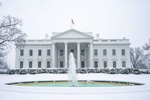 The north side of the White House is seen covered in snow Sunday, January 13, 2019