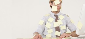 A man covered in sticky notes featuring tips for getting organized in the new year.