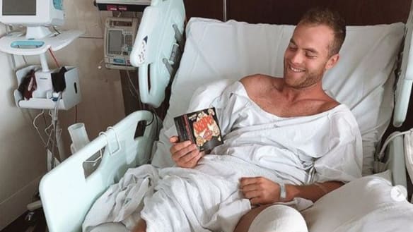 Tom Mitchell recovers in hospital.