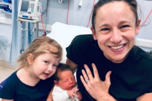 Josephine Dun with mum Phoebe and baby sister Harriet. 