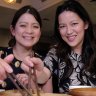 Nancy and Lucy Chen, owners of Mr Chen's sample the dumplings at Shark Fin House in Melbourne's China Town ahead of Chinese New Year. 