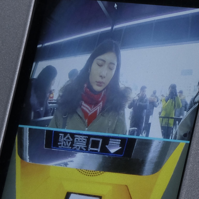 Ticket checking machine with facial recognition technology.