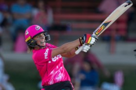 Ashleigh Gardner of the Sixers brings up her century during the Women's Big Bash League cricket match between the Sydney Sixers and the Melbourne Stars at North Sydney Oval in Sydney, on Saturday, December 9, 2017. (AAP Image/Craig Golding) NO ARCHIVING, EDITORIAL USE ONLY, IMAGES TO BE USED FOR NEWS REPORTING PURPOSES ONLY, NO COMMERCIAL USE WHATSOEVER, NO USE IN BOOKS WITHOUT PRIOR WRITTEN CONSENT FROM AAP